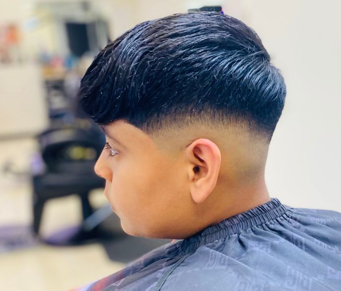 a children's haircut from we the gentlemen barber shop
